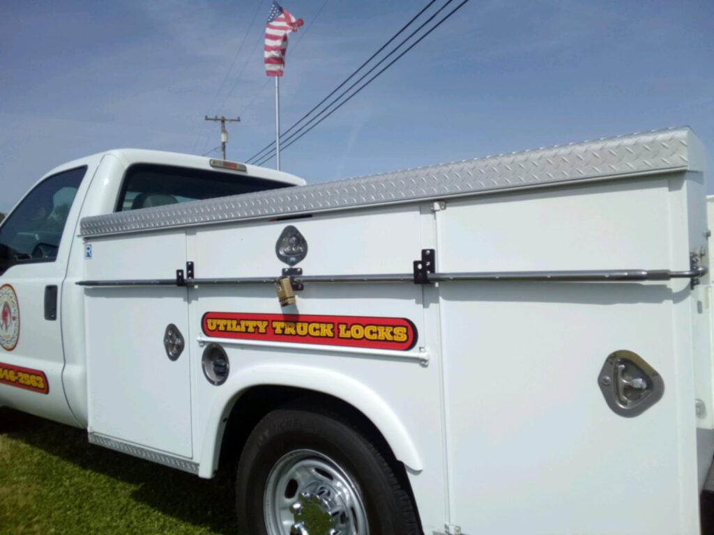 Utility truck lock bar